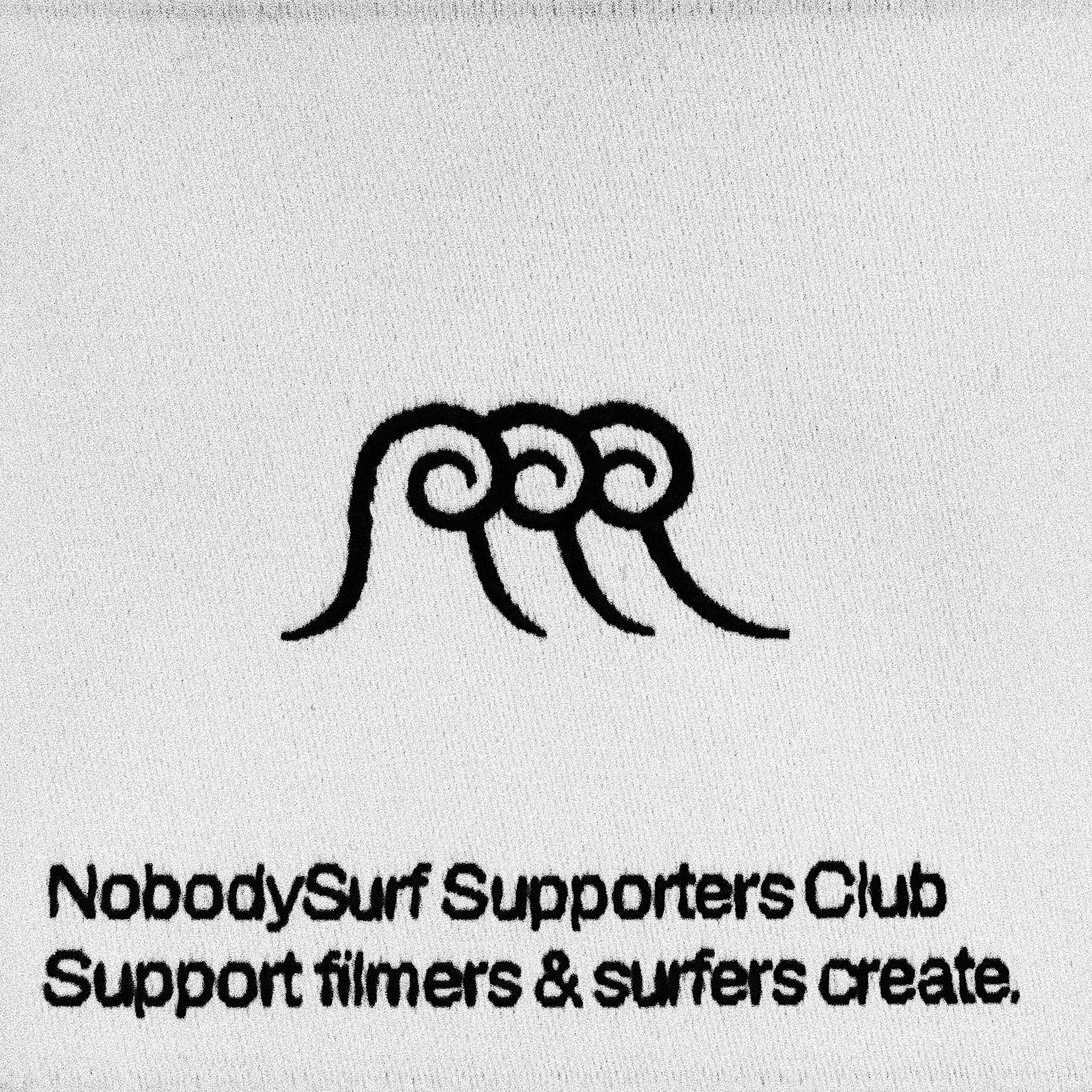 upcoming-studio-nobodysurf-tshirt-tag-unframed.jpg